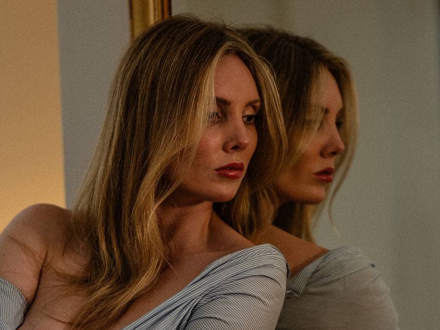 A doubled, mirrored portrait.